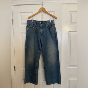 Men’s Lucky Brand Jeans. Waist size is 34”. Color is blue.